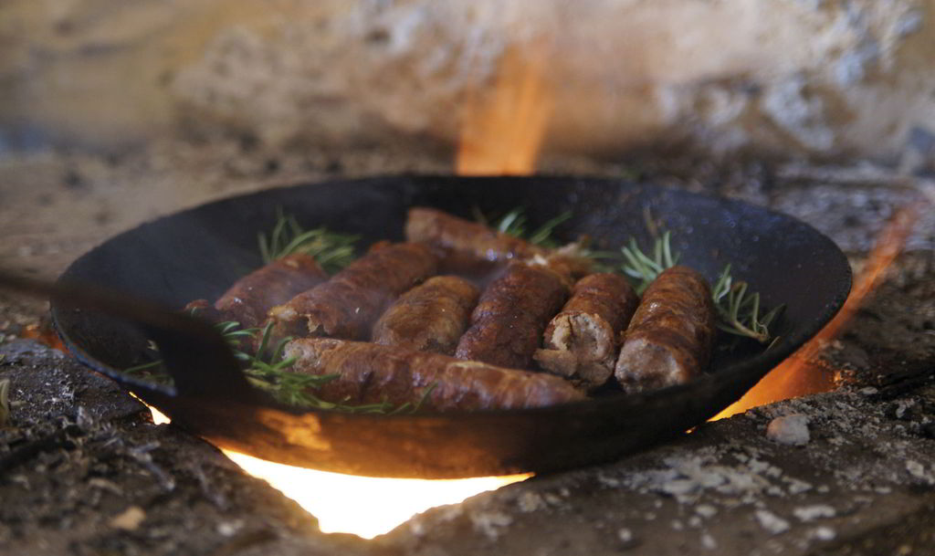 Don’t miss the taste of local charcuteries’ and especially “kapnisto loukaniko” traditional smoked sausage or smoked pork named “apaki”.
